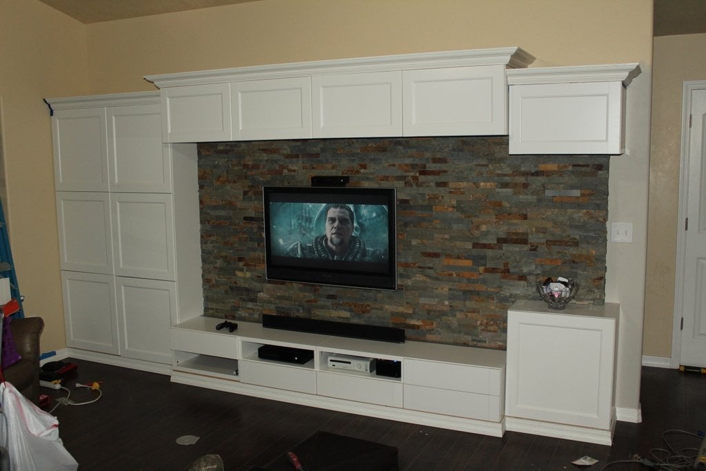 BESTA built in with stone wall for TV